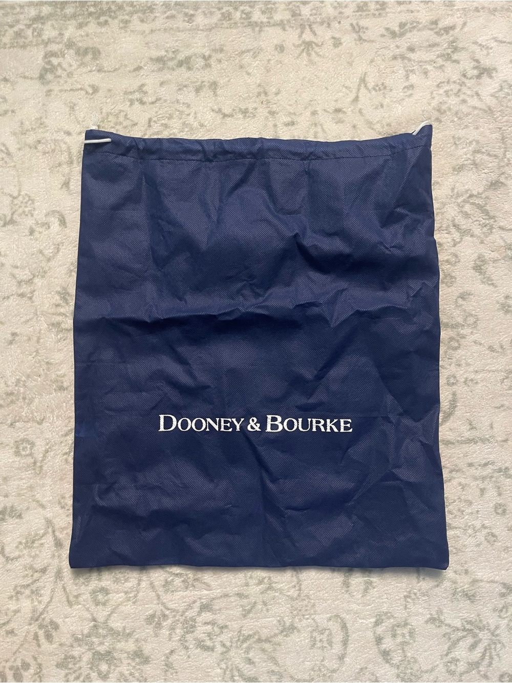 44. Dooney and Bourke dust bag.